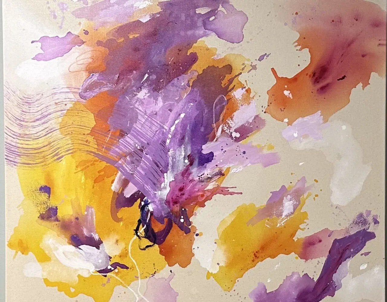 A painting of purple and yellow colors on paper.